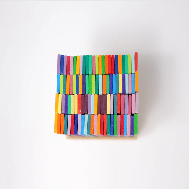 Stack of colorful wooden blocks on a white background