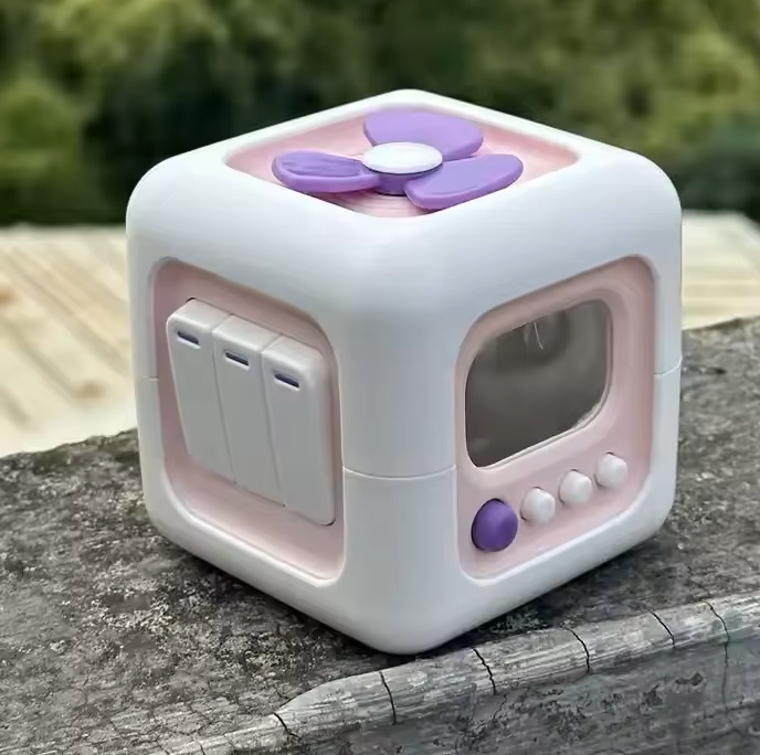 Portable Montessori busy cube for travel and on-the-go play