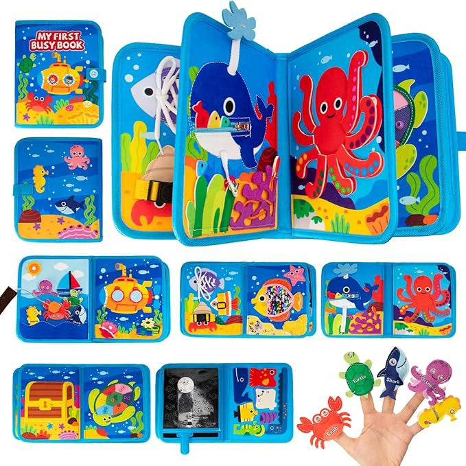 Toddler learning alphabet A-Z with sea animals in felt busy book
