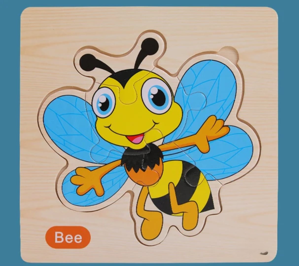 Wooden bee puzzle on a wooden base with a blue background