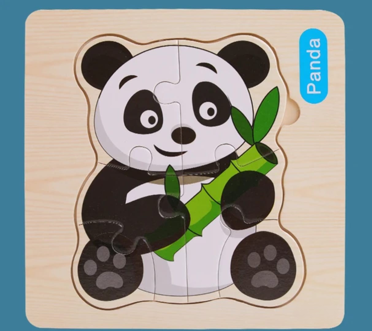 Wooden panda puzzle with a blue label on a teal background