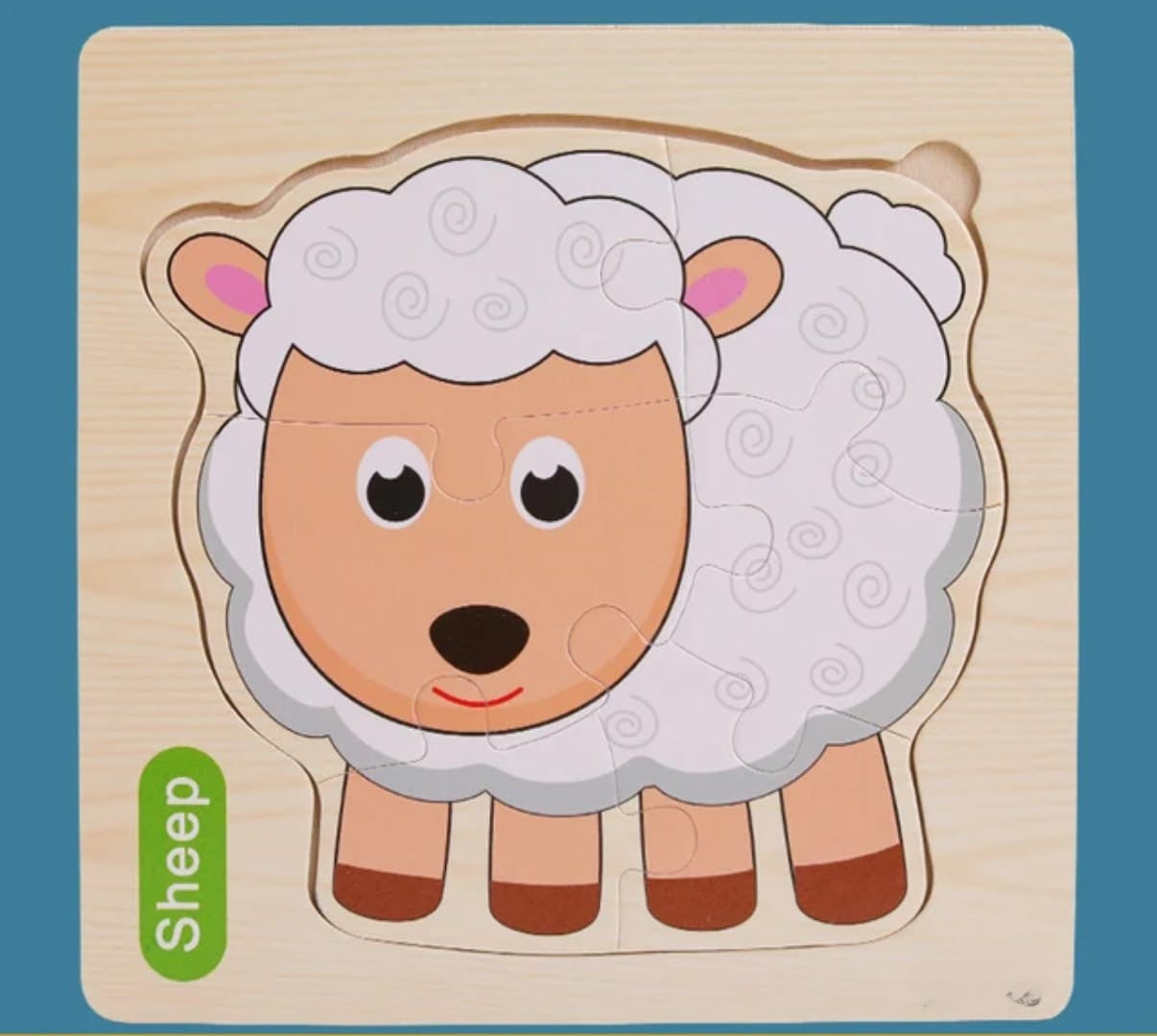 Wooden puzzle of a sheep on a blue background