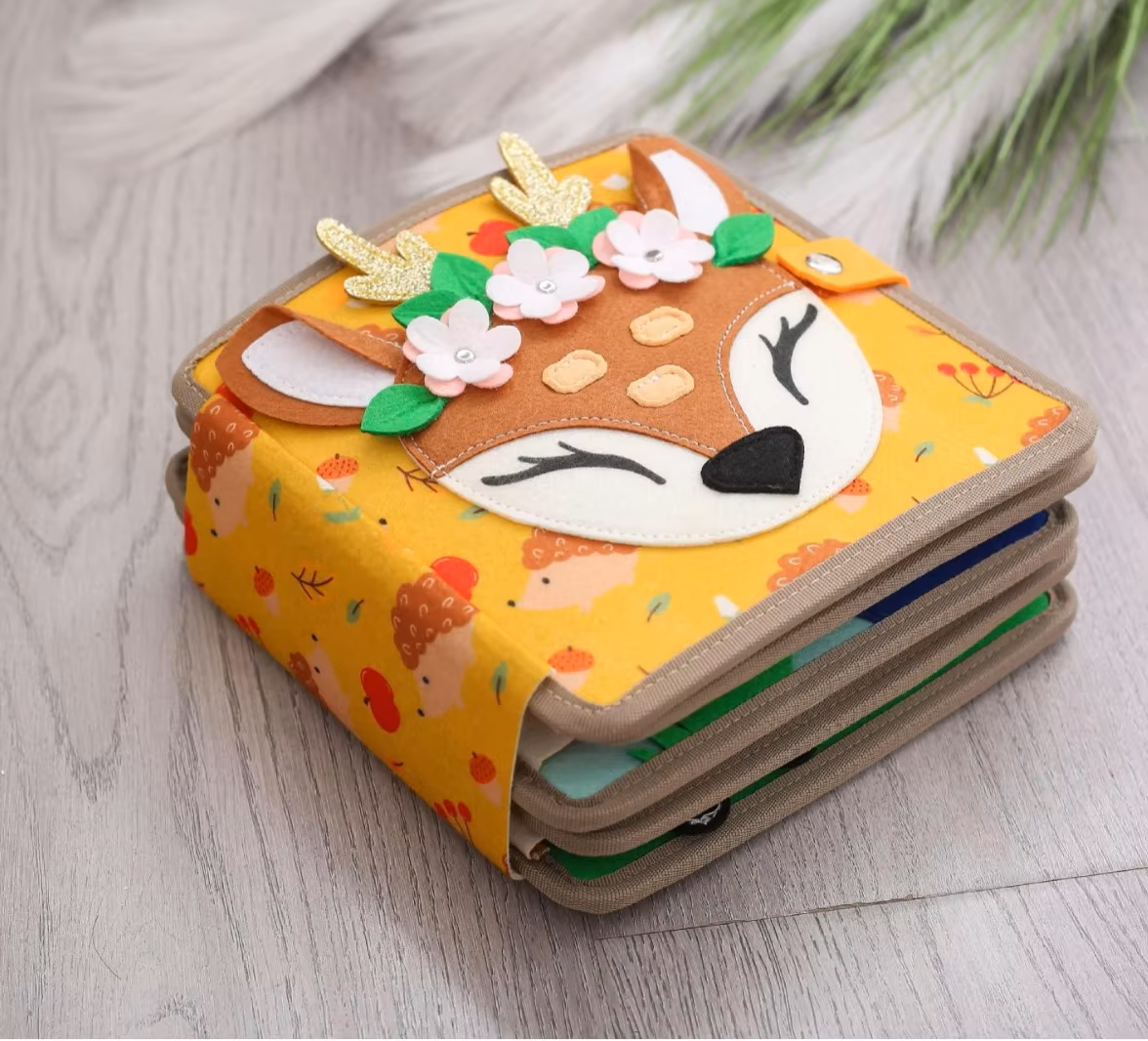 Cover of woodland-themed Montessori quiet book featuring a friendly deer for toddlers

